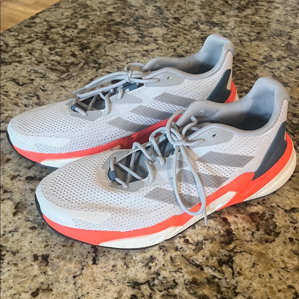 Adidas Jetboost Light Gray and Bright Orange athletic shoes